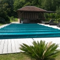 Bâche pour piscine avec barres